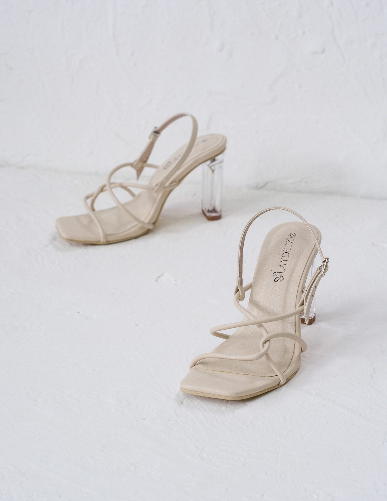 Fay Square Toe Glass Heels.