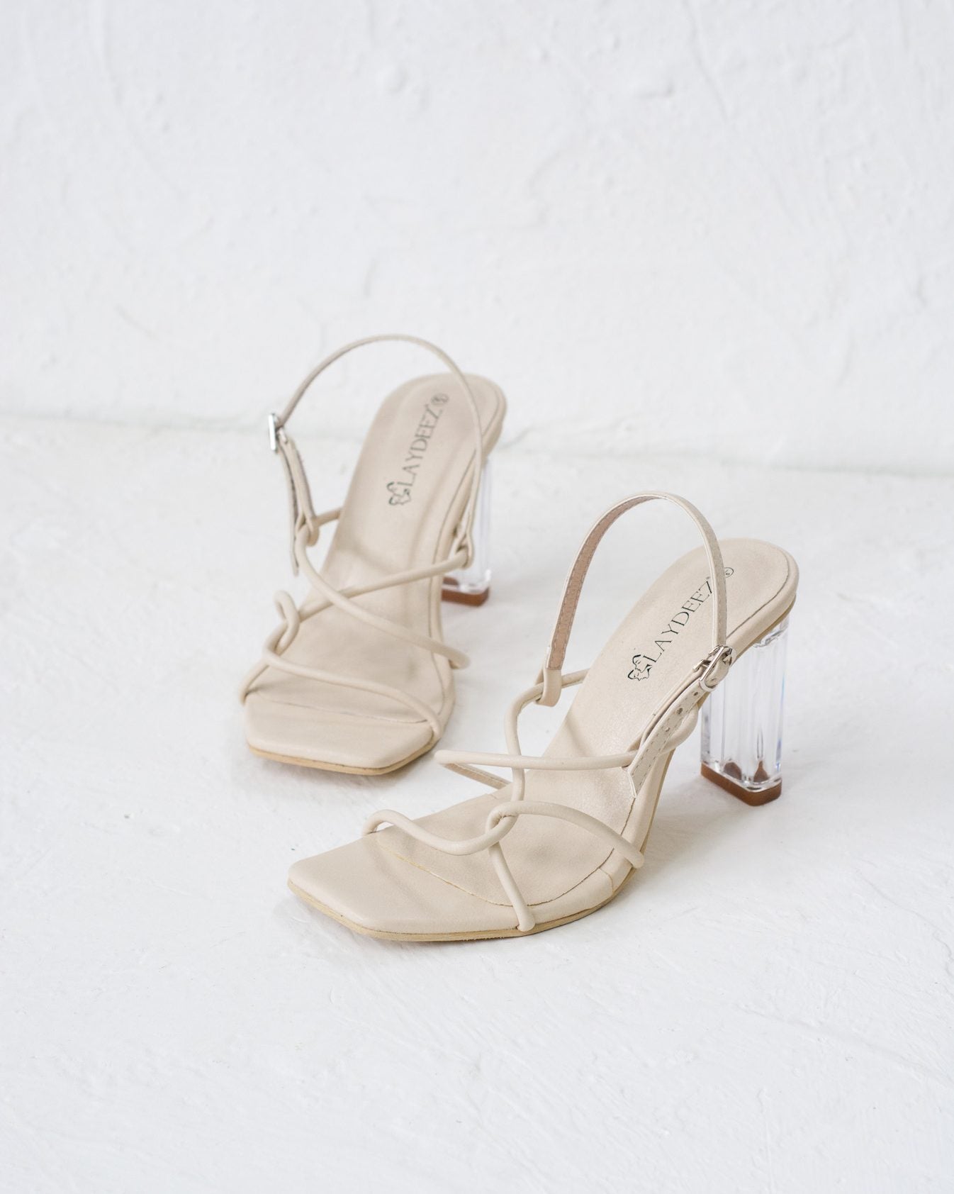 Fay Square Toe Glass Heels.