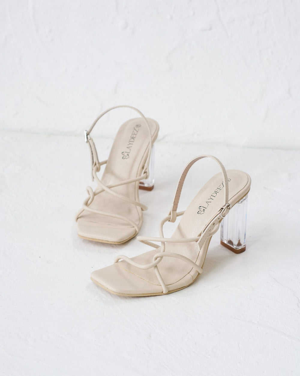 Fay Square Toe Glass Heels.